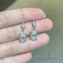 Load the video into the gallery viewer and play, Moissanite Pear Earrings Moissanite pear-shaped 6.7 card earrings
