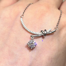 Load the video into the gallery viewer and play, Moissanite Knot 1ct Necklace Moissanite Knot necklace

