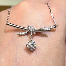 Load the video into the gallery viewer and play, Moissanite Knot Necklace moissanite knot necklace
