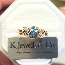 Load the video into the gallery viewer and play, Moissanite Swiss Blue Ring Customized Swiss blue moissanite arabesque rose ring
