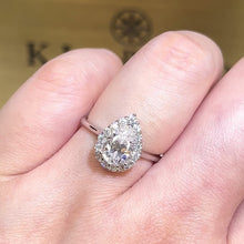 Load the video into the gallery viewer and play, Moissanite Pear Halo Ring full moissanite pear-shaped surrounding ring
