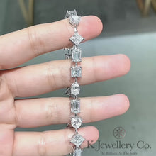 Load the video into the gallery viewer and play, Moissanite Elegant Irregular Princess Square Heart-shaped Emerald Oval Cut Bracelet Luxurious and noble 1 carat special-shaped moissanite princess square heart-shaped emerald cut oval bracelet
