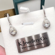 Load the video into the gallery viewer and play, Moissanite Pear Halo Earring Moissanite drop-shaped earrings
