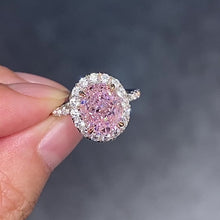 Load the video into the gallery viewer and play, Cubic Zirconia Pink The One Halo Ring Pink high carbon diamond 3 carat egg-shaped surrounding ring
